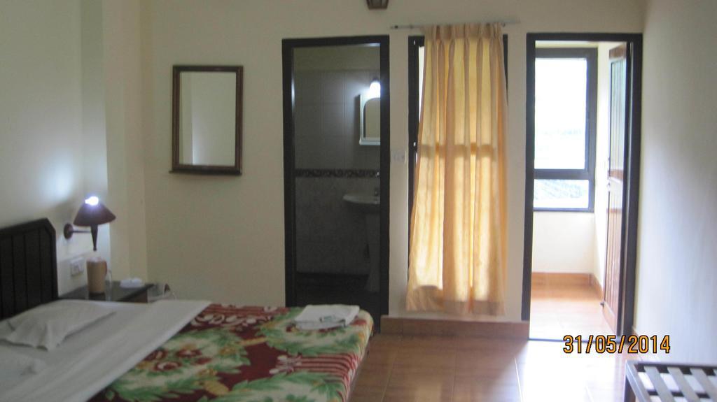 Poopada Hotel Munnar Quarto foto