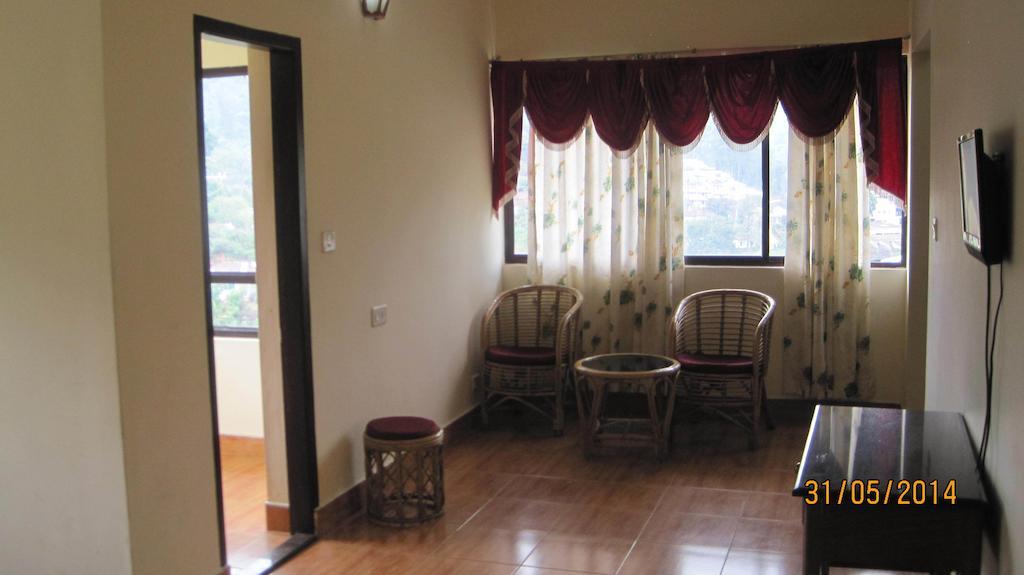 Poopada Hotel Munnar Quarto foto